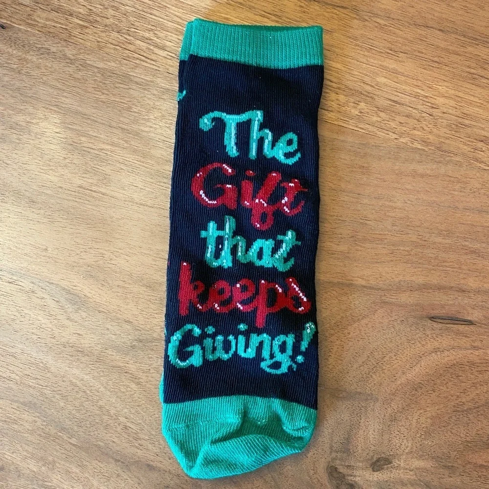 New without Tags. Set of 12 National Lampoon Christmas Vacation socks.